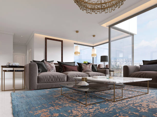 istock Modern luxury living room interior with a sofa, armchairs, a coffee table and a dining table with a kitchen. 1086890132