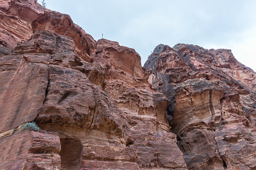 Al-Siq - canyon leading through red-rock walls to Petra - the capital of the Nabatean kingdom in Wadi Musa city in Jordan