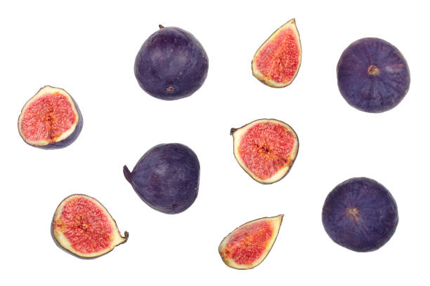 istock fig fruits isolated on white background. Top view. Flat lay pattern 1086895894