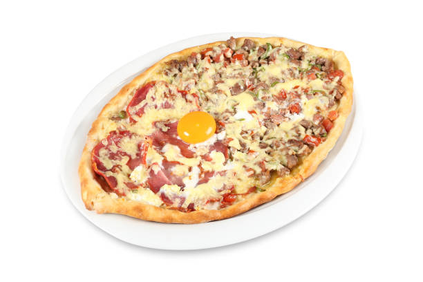 istock Turkish traditional mixed Karadeniz pide. Karisik pide. Isolated on white background. 1086899468