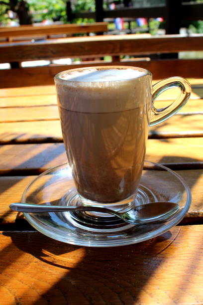 istock Cocoa with foam in clear glass cup 1086903776