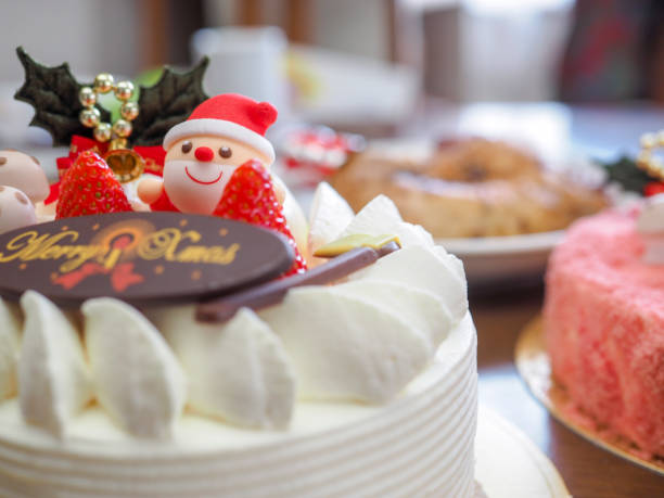 Christmas cake Christmas cake(Strawberry sponge cake)with santa christmas cake stock pictures, royalty-free photos & images