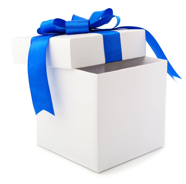 istock White gift box with blue ribbon and toy. 1086912430