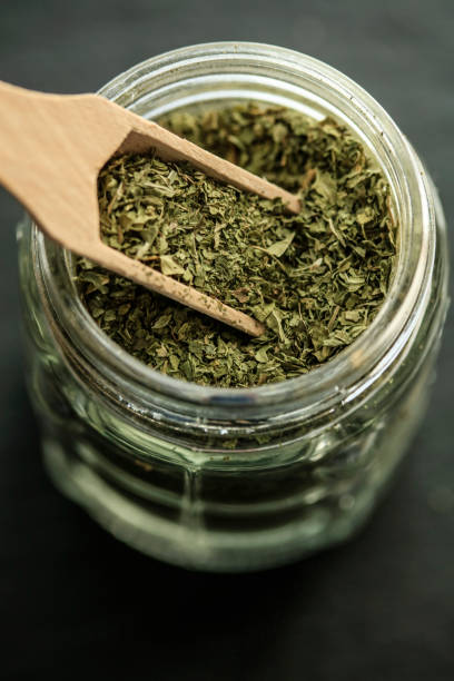 istock Dried thyme on wooden spoon 1086914802