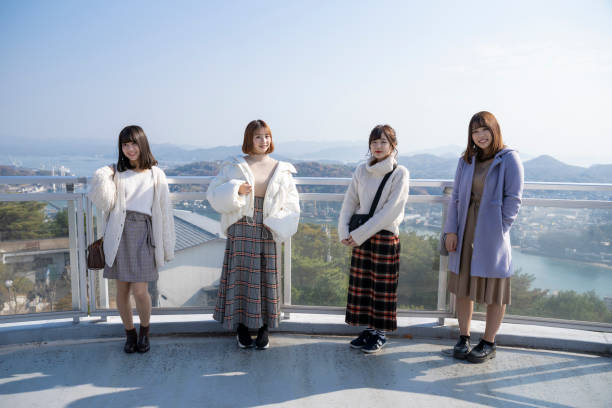 istock Women taking commemorative photos while traveling 1086916908