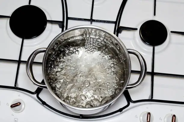 Photo of casserole with boiling water