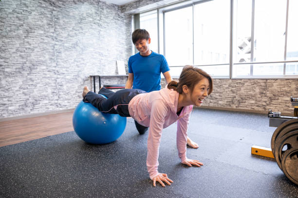istock Stretching at the sports gym 1086925306