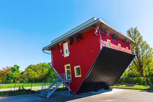 Putbus, Germany - May 09, 2018: upside down standing house in Putbus, Ruegen. It is build for tourist attraction and can be visited