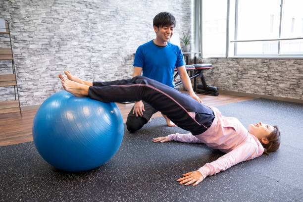 istock Stretching at the sports gym 1086925366