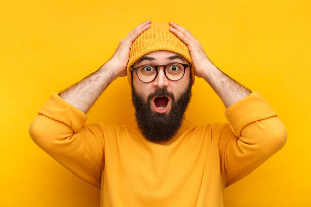 istock Bearded puzzled hipster in glasses 1086941034
