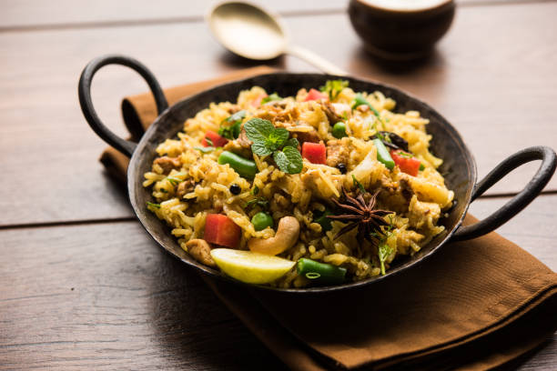istock Kheema Pulao - Rice cooked with mutton or chicken mince with vegetables and spices. served in a bowl. selective focus 1086947324