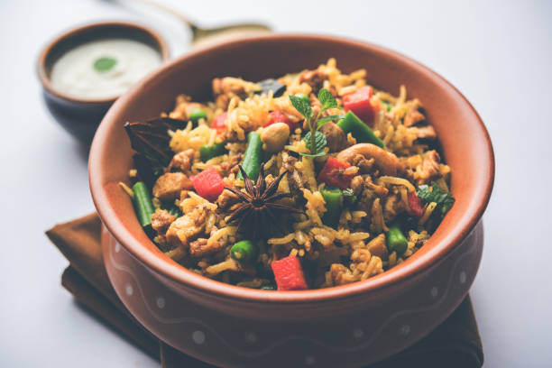 istock Kheema Pulao - Rice cooked with mutton or chicken mince with vegetables and spices. served in a bowl. selective focus 1086951264