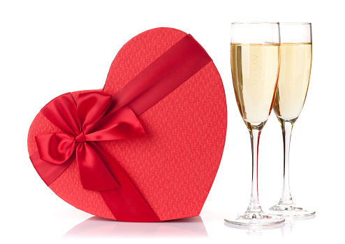 Valentines day gift box and champagne glasses. Isolated on white background