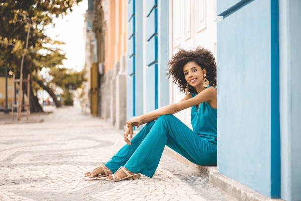 istock Afro fashion sitting on the floor 1086961504