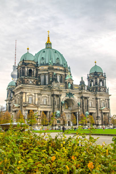 the majestic berlin cathedral, the building and the dome of the protestant cathedral in berlin, germany. - medieval autumn cathedral vertical imagens e fotografias de stock