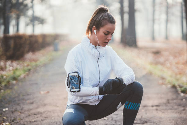 istock Sportswoman checking pulse on smartwatch 1086977212