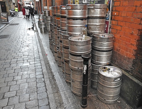 26th December 2018, Dublin, Ireland: Beer kegs in a Temple bar lane-way in Dublin City Centre reflecting out popular pub culture.