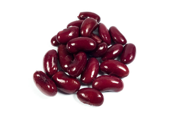 istock Red kidney beans isolated on white background 1086988504