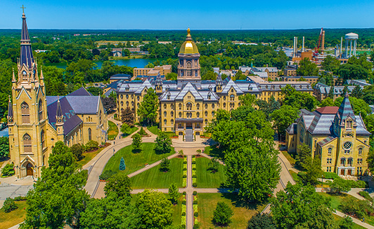 The University of Notre Dame Campus with Golden Dome, Basilica of the Sacred Heart, and Washington Hall.