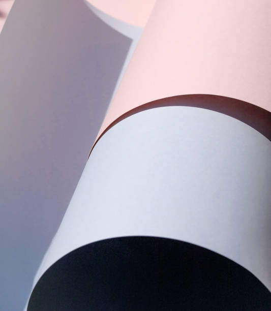 istock Abstract background in light pastel blue and pink. Paper rolls. Copy space 1087003920
