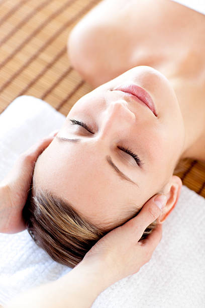 istock Caucasian relaxed woman having a head massage 108700677
