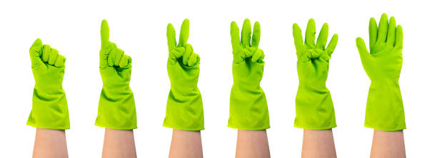 istock Set of hands in green protective rubber gloves isolated 1087006798