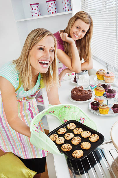 istock Laughing woman baking together 108700777