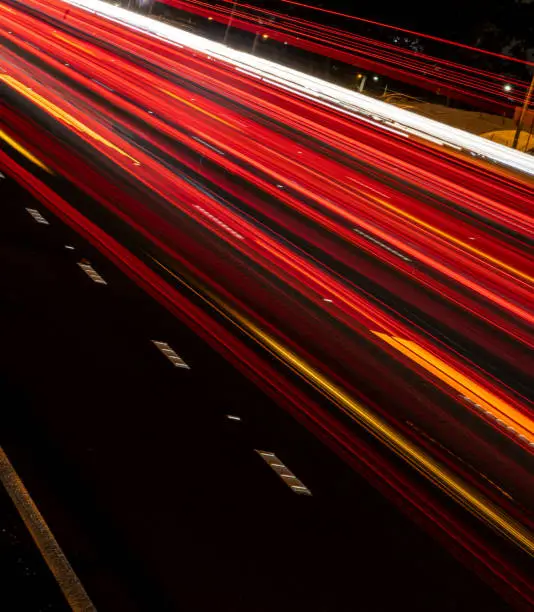 Vibrant Light trail of a highway from the side of the road. Vibrant colour