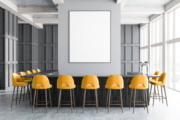 istock Gray bar interior, yellow chairs and poster 1087012038