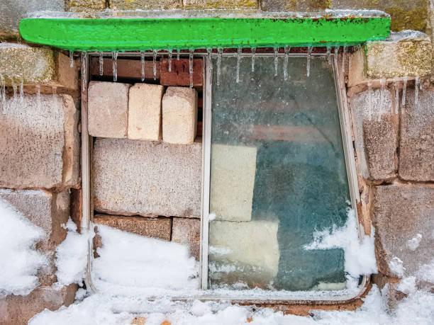 istock bricks and cinder blocks from the bus window on the front wall with icicles 1087015062