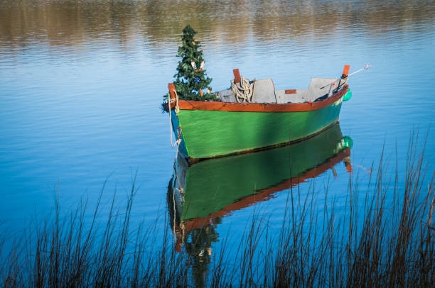 istock Christmas Boat on Salt Pond 1087016468