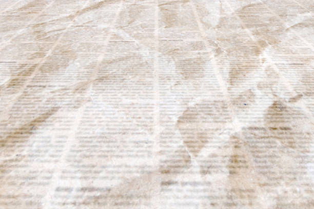 istock Newspaper with old vintage unreadable paper texture background 1087038238