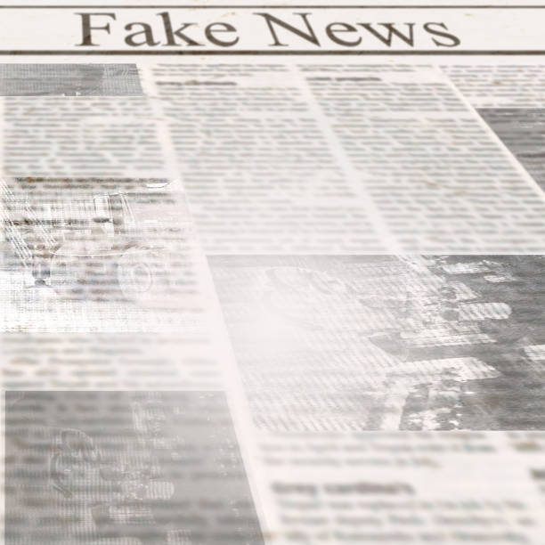 istock Newspaper with headline Fake News and old unreadable text 1087038250