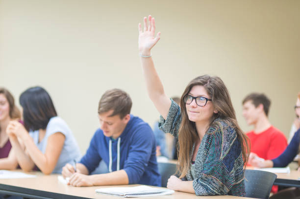 istock College students asking questions in the classroom 1087038580