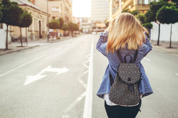 istock Walking down the city street 1087039718
