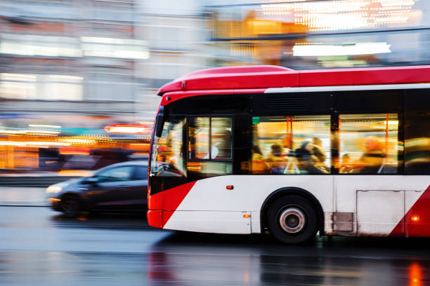 istock driving bus in the city at night 1087073102