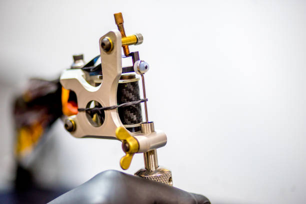 istock tattoo equipment machine and colorful ink in a workshop 1087094714