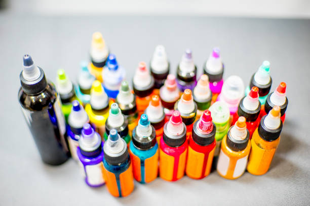 istock tattoo equipment machine and colorful ink in a workshop 1087094756