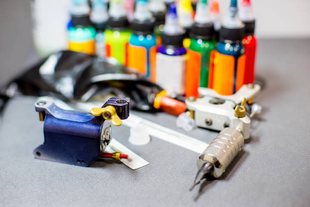 istock tattoo equipment machine and colorful ink in a workshop 1087096000