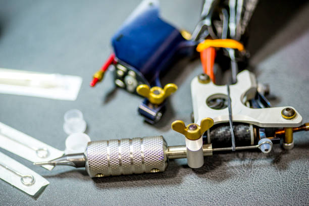 istock tattoo equipment machine and colorful ink in a workshop 1087096362