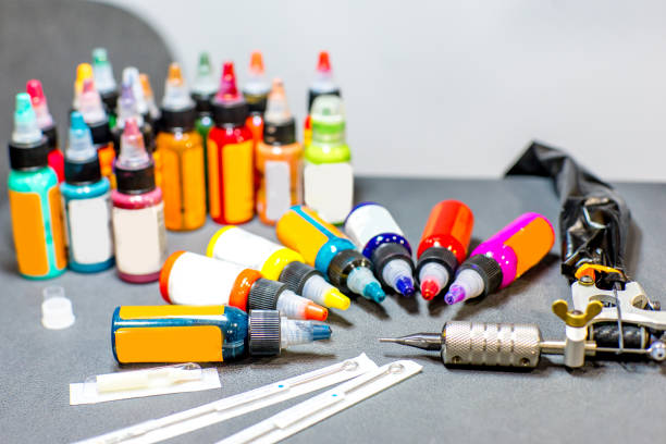 istock tattoo equipment machine and colorful ink in a workshop 1087096392