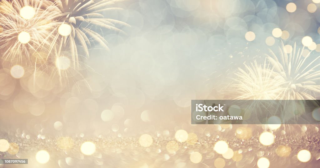 Gold Vintage Fireworks and bokeh in New Year eve and copy space. Abstract background holiday. Backgrounds Stock Photo