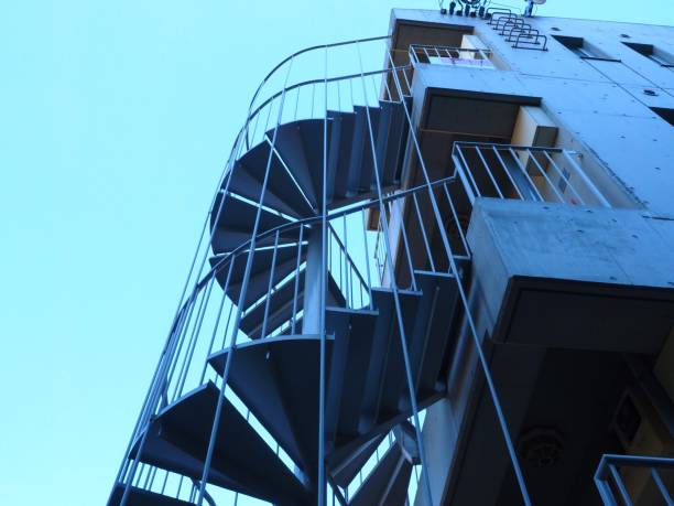 istock emergency spiral stairs, looking up scene 1087100560