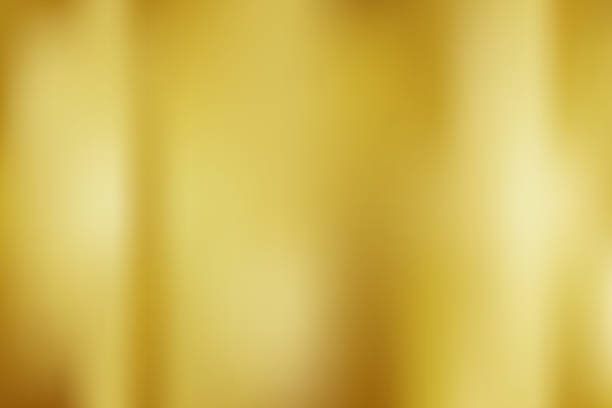 istock Abstract gold gredient metal color theme satin texture background. Lighting effects of flash. Blurred vector background with light glare, EPS10 illustration. 1087108842