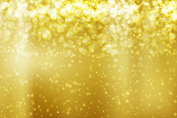 istock Abstract colorful bokeh and glowing spakling shining particles in random gold color theme background. Lighting effects of flash. Blurred vector background with light glare, EPS10 illustration. 1087108866