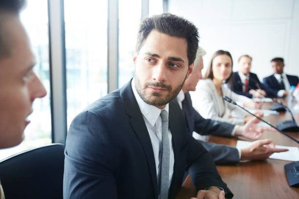 istock Handsome Businessman in Meeting 1087110540