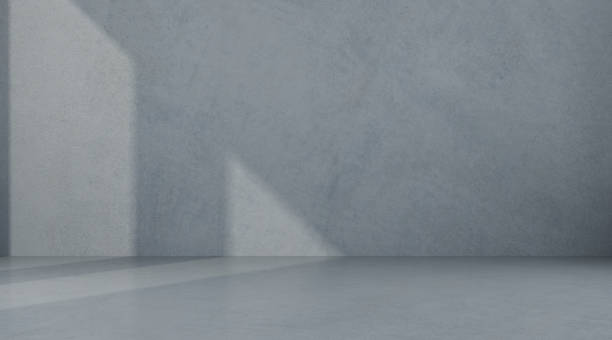 istock Abstract of empty room space with sun light cast the window shadow on the wall and floor,Perspective of minimal design architecture.3d render 1087122106