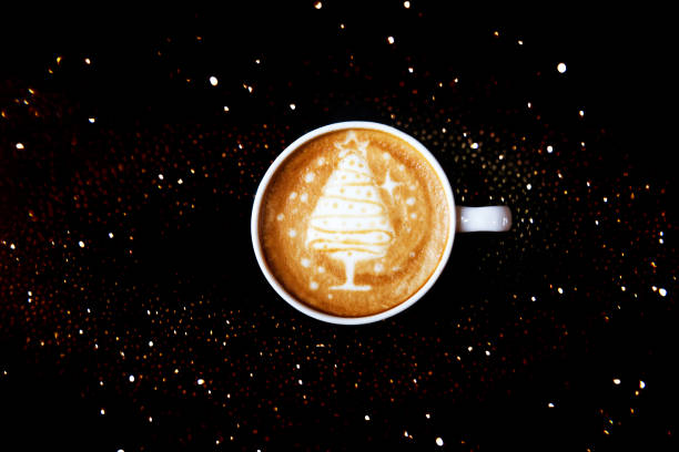 istock Tasty cappuccino with Christmas tree latte art with some blurred lights. 1087123724