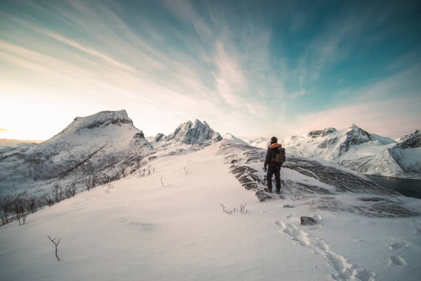 Free Stock Photo of Man Standing on Snow Covered Mountain Top ...