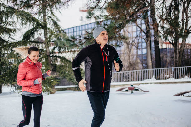 istock Running outdoors in a park - couple 1087129032